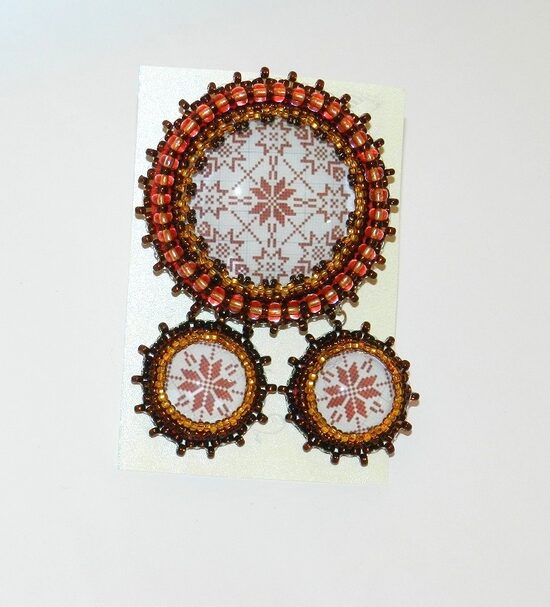 Piespraudes un auskaru komplekts Auseklītis